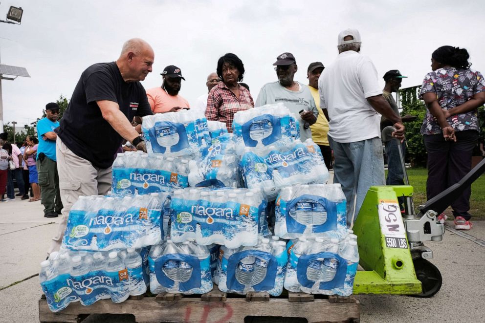 PHOTO: A pallet of bottled water is delivered to a recreation center on August 13, 2019 in Newark, New Jersey.