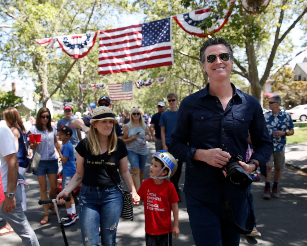 PHOTO: California Gov. Gavin Newsom joined others at the annual East Sacramento 4th of July Parade in Sacramento, Calif., July 4, 2019. 