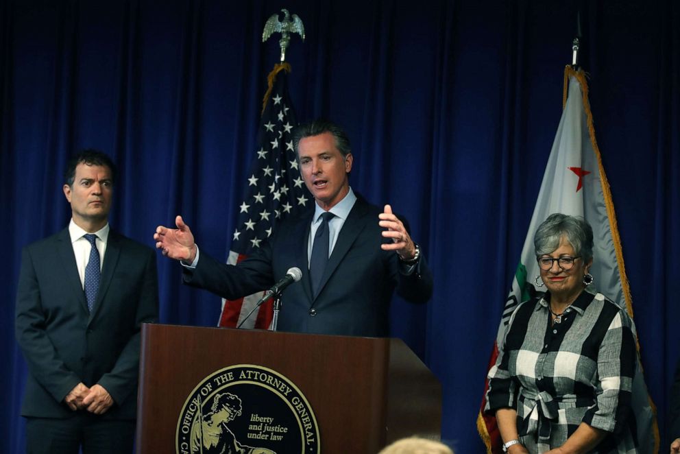 PHOTO: California Gov. Gavin Newsom (C) speaks during a news conference at the California justice department, Sept. 18, 2019, in Sacramento, Calif.