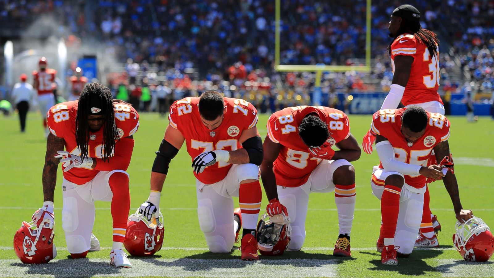 NFL players protest during national anthem, drawing criticism from Trump