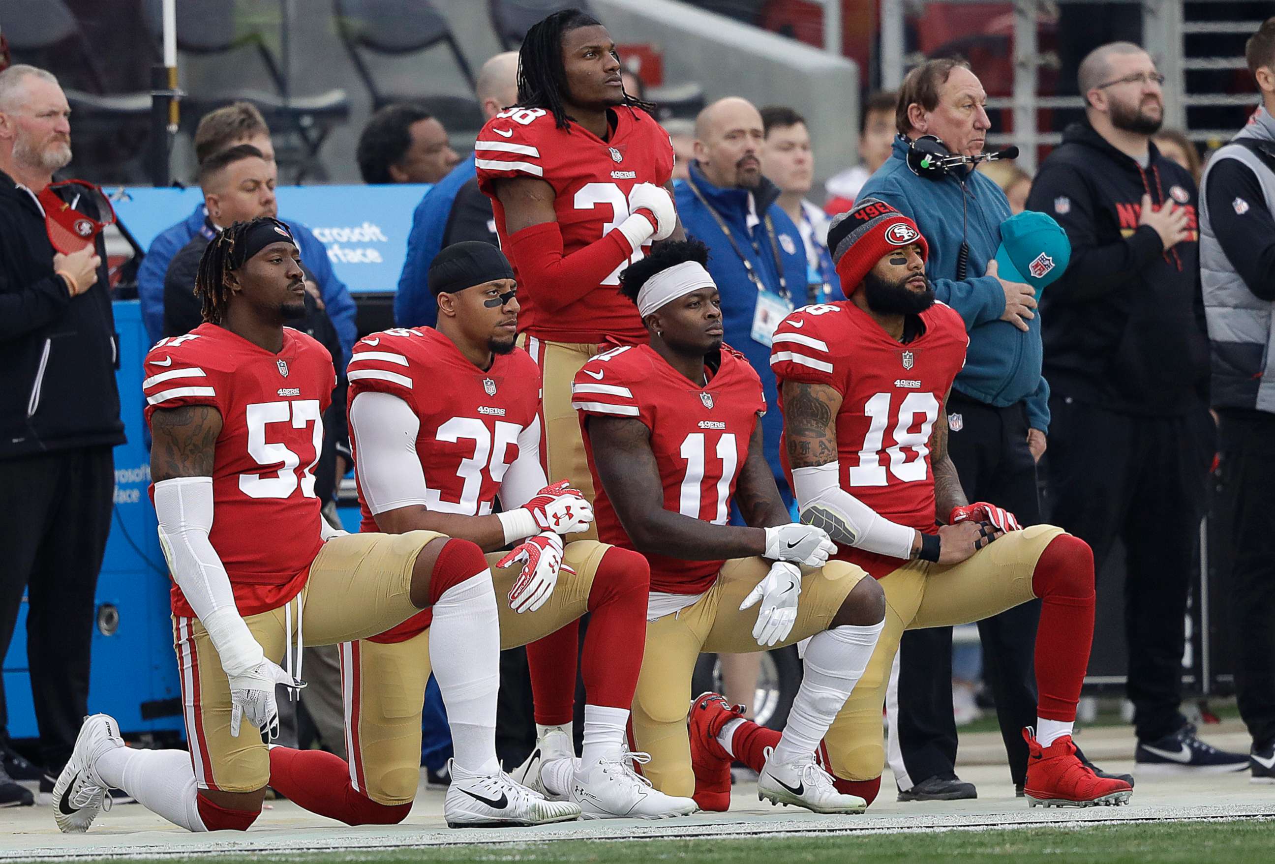 PHOTO: San Francisco 49ers' Eli Harold, Eric Reid, Marquise Goodwin and Louis Murphy kneel during the national anthem before an NFL football game against the Jacksonville Jaguars in Santa Clara, Calif., Dec. 24, 2017.
