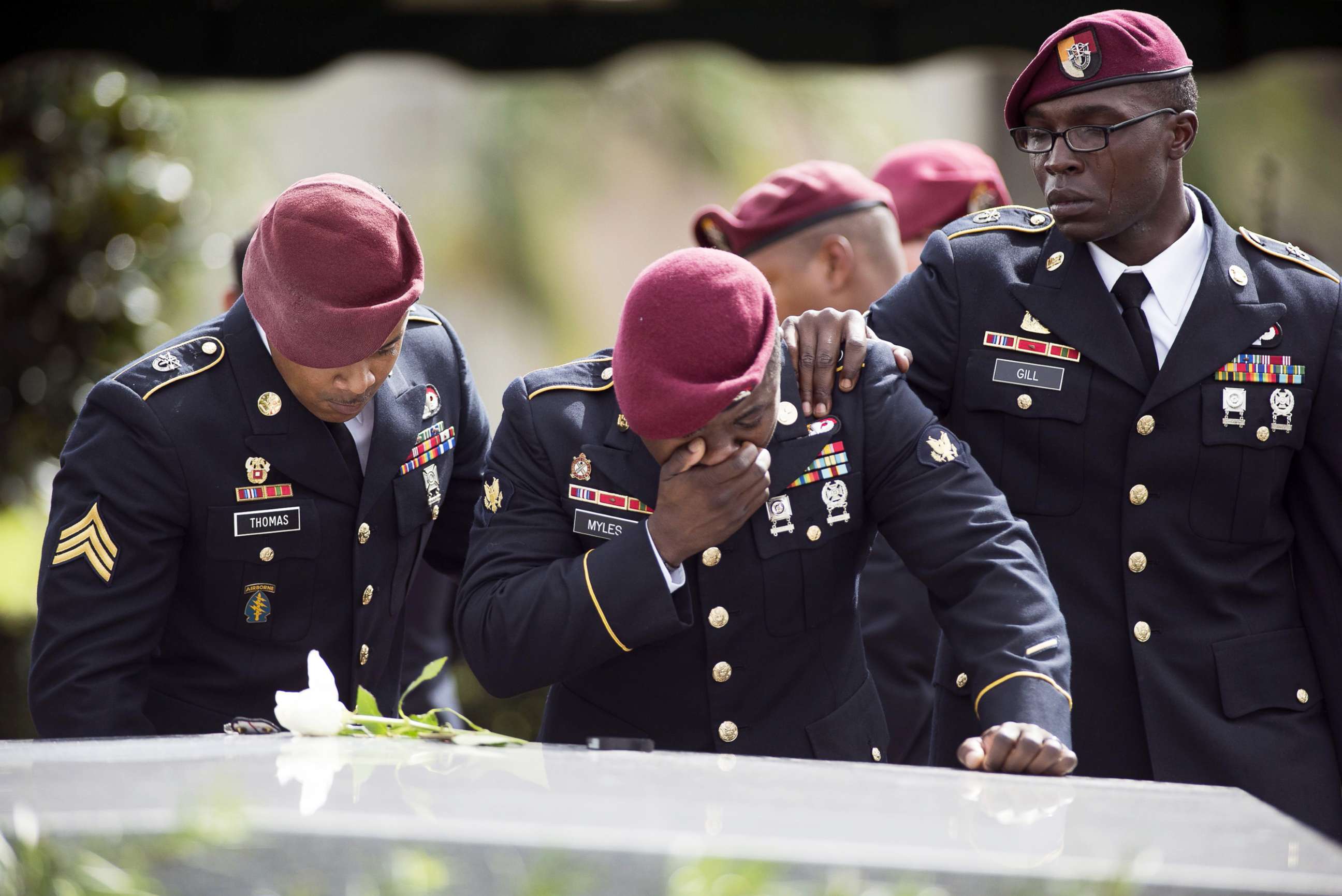 PHOTO: Members of the 3rd Special Forces Group, 2nd battalion, cry at the tomb of U.S. Army Sgt. La David Johnson at his burial service in the Memorial Gardens East cemetery on Oct. 21, 2017 in Hollywood, Fla. 
