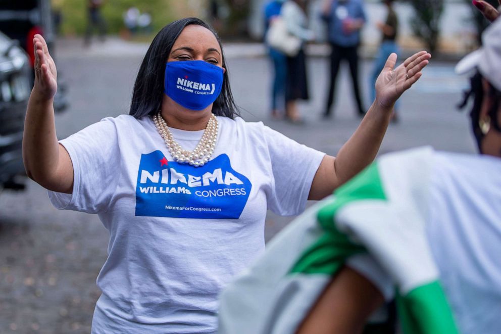 PHOTO: Democratic Congressional candidate Nikema Williams greets a supporter during a campaign event in Jonesboro, Ga., Oct. 27, 2020.
