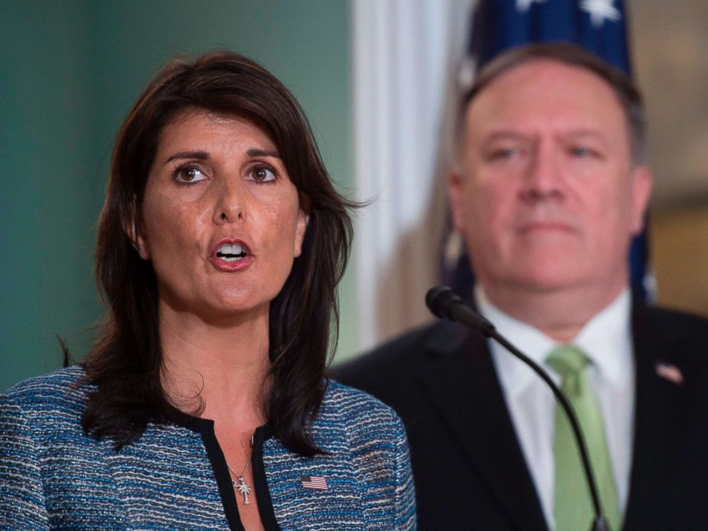 PHOTO: Secretary of State Mike Pompeo looks on as Ambassador to the United Nation Nikki Haley speaks at the Department of State in Washington on June 19, 2018.