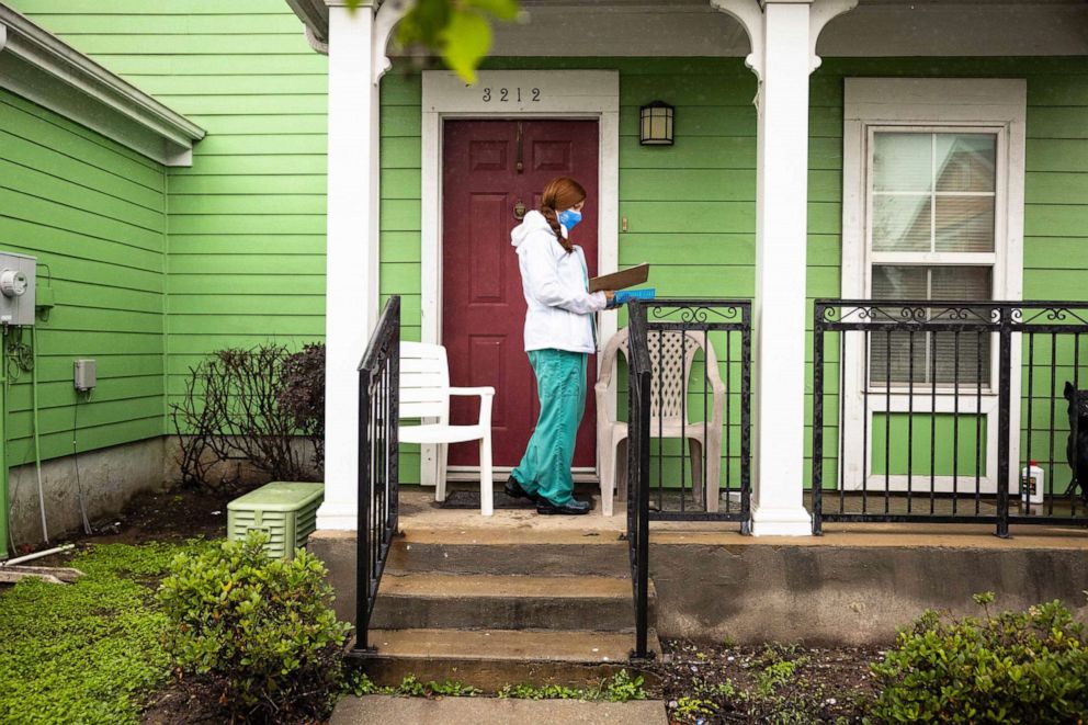 PHOTO: Nurse practitioner Sophia Thomas goes door-to-door administering COVID-19 vaccines in New Orleans on April 17, 2021.