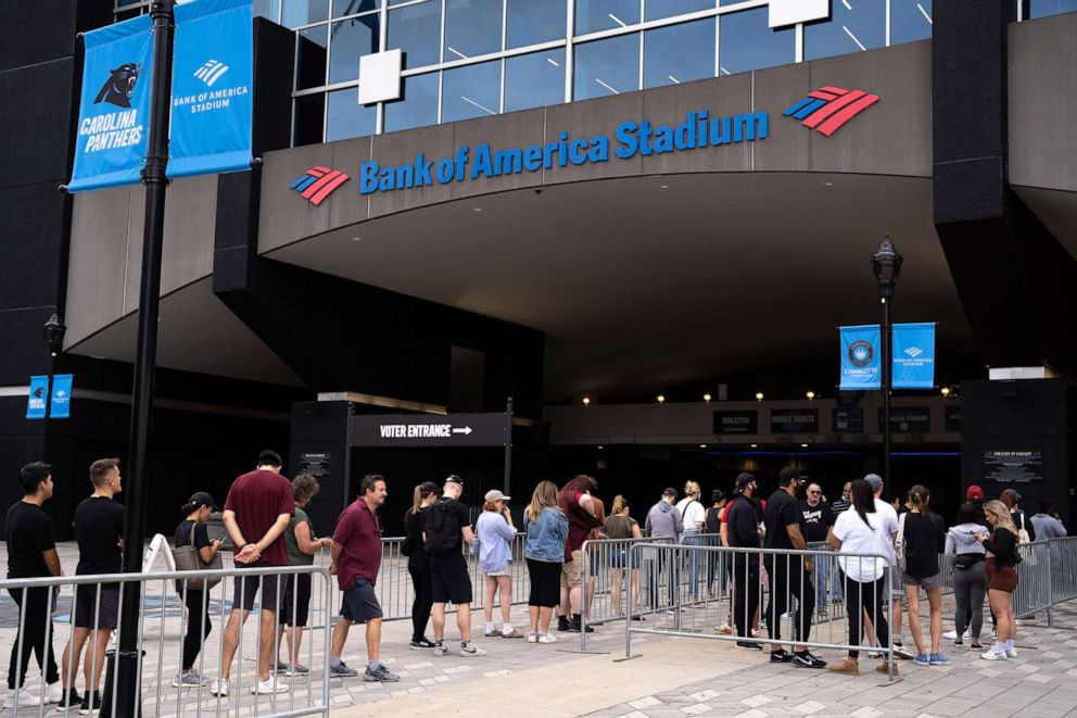 PHOTO: People wait in line to vote at Bank of America Stadium, Nov. 5, 2022, in Charlotte, N.C.