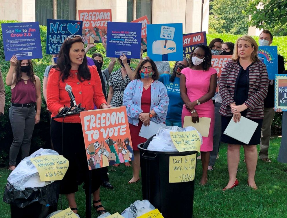 PHOTO: Allison Riggs, co-executive director of the Southern Coalition for Social Justice, speaks at a news conference outside the Legislative Building in Raleigh, N.C., June 14, 2021.