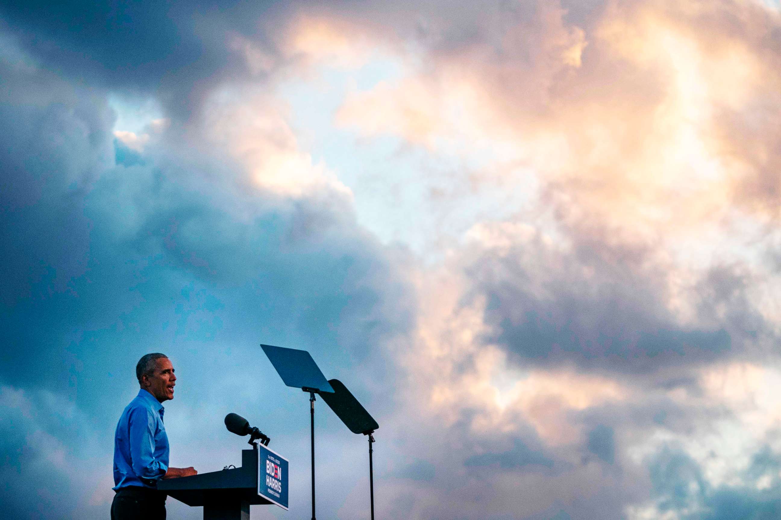 PHOTO: Former US President Barack Obama addresses Biden-Harris supporters during a drive-in rally in Philadelphia, Oct. 21, 2020.