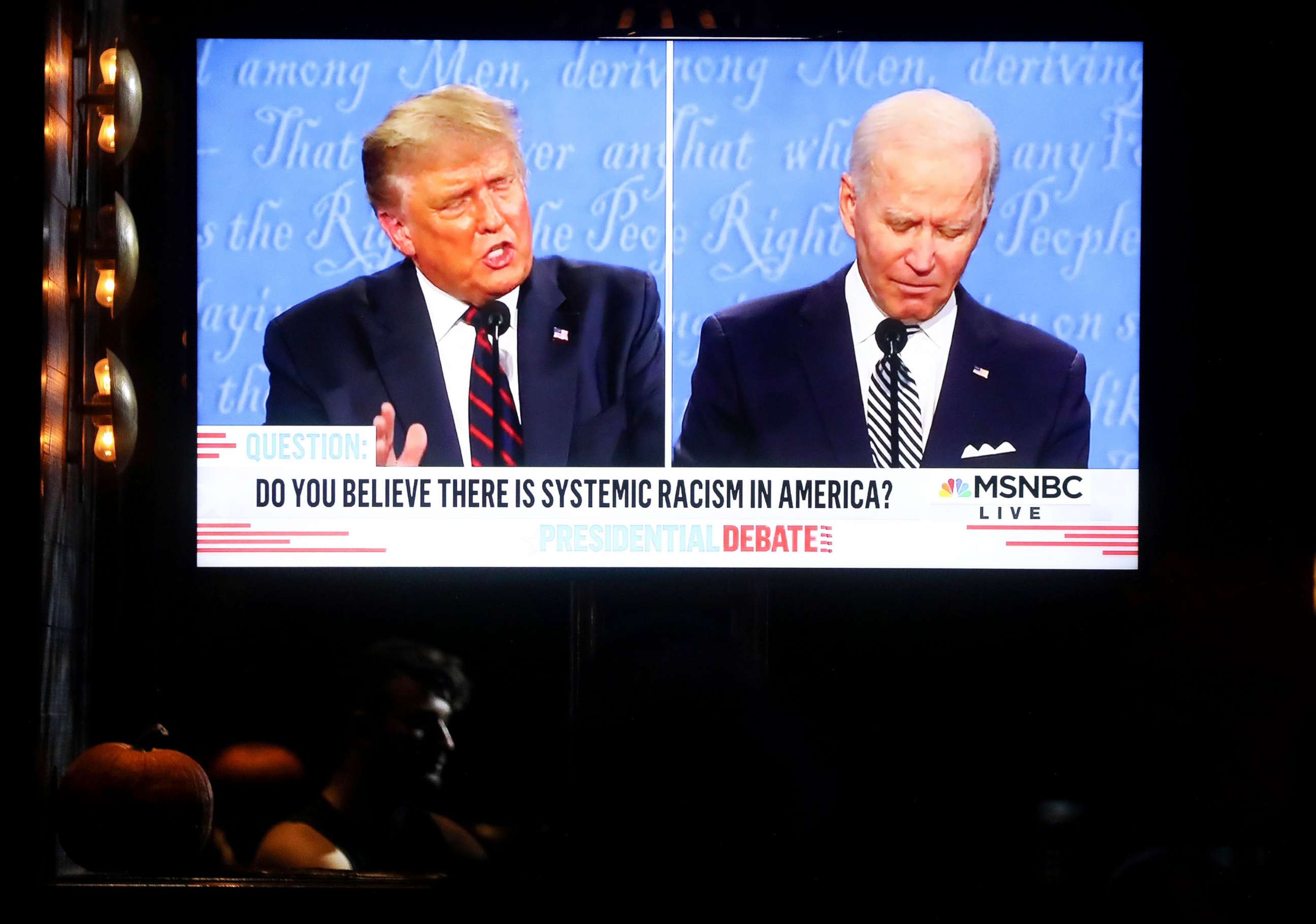 PHOTO:  A broadcast of the first debate between President Donald Trump and Democratic presidential nominee Joe Biden is played on a TV at The Abbey in West Hollywood, Calif., Sept. 29, 2020.