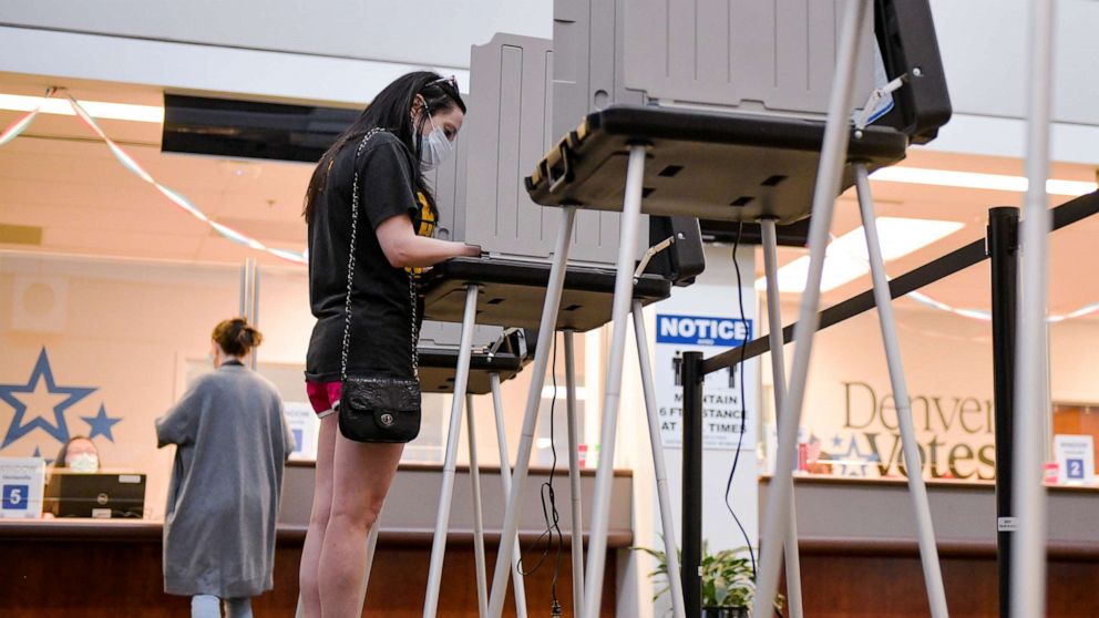 PHOTO: Jennifer Gance votes in the primary election at a polling center in Denver, Colo., June 30, 2020.