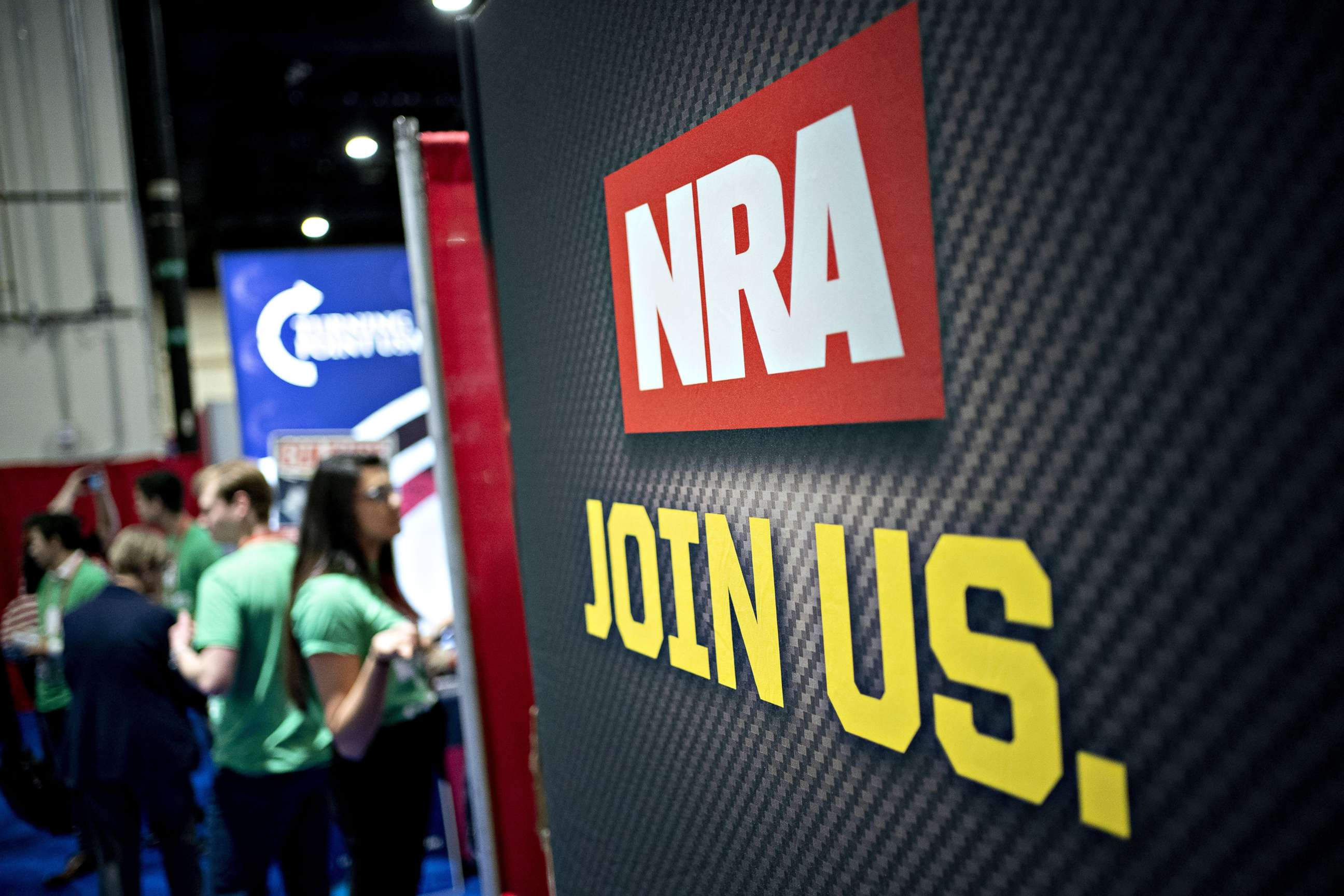 PHOTO: In this Feb. 28, 2020 file photo National Rifle Association (NRA) signage stands in the exhibition hall during the Conservative Political Action Conference (CPAC) in National Harbor, Md. 