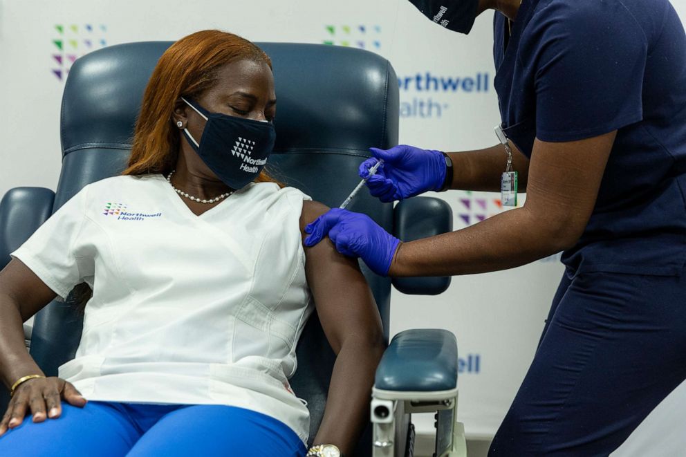 PHOTO: A nurse receives the COVID-19 Pfizer vaccine booster at Teaching Center LIJ Medical Center in New Hyde Park, N.Y., Oct. 6, 2021.