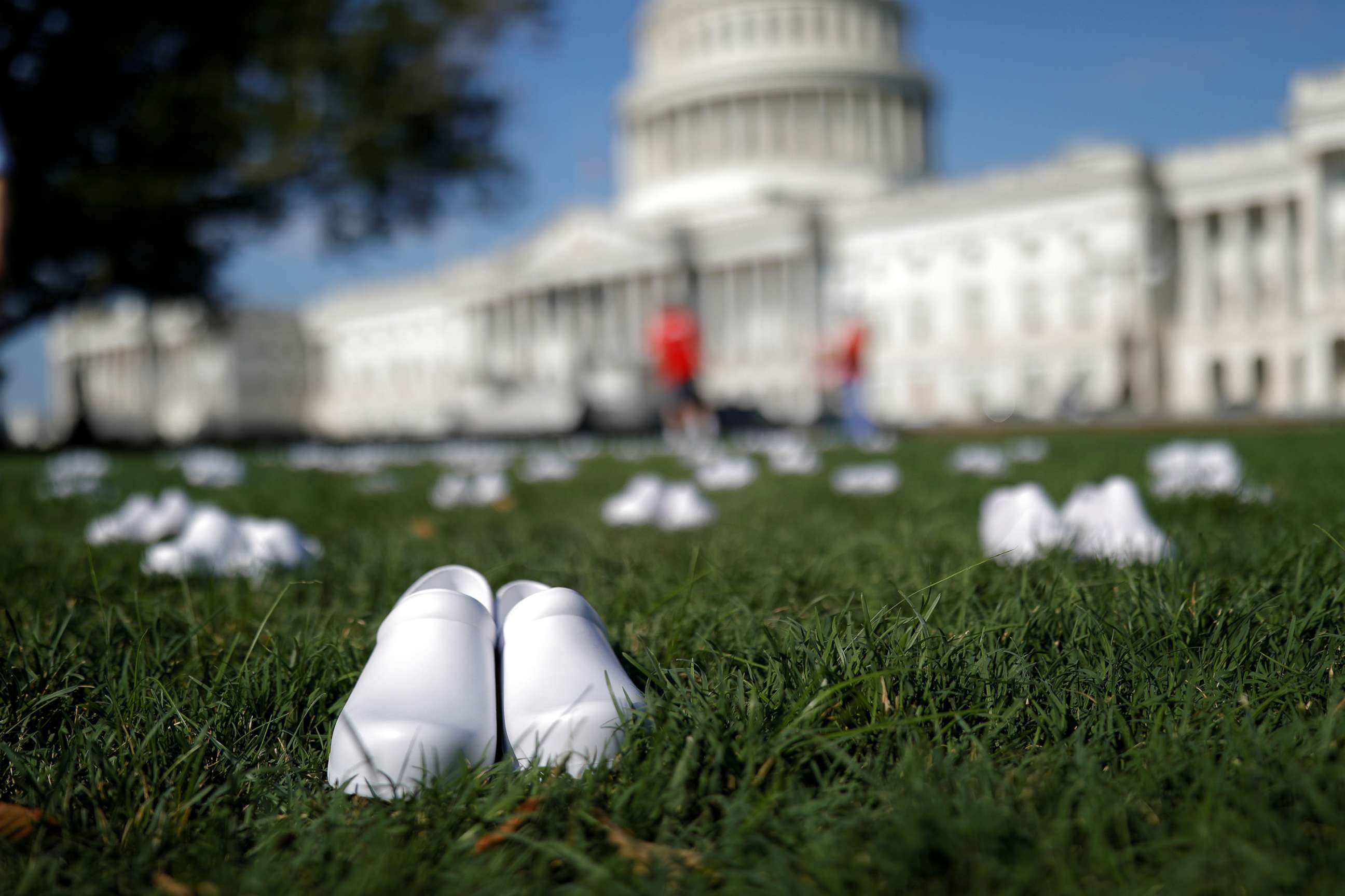 PHOTO: White shoes are displayed during a demonstration by Registered Nurses and the National Nurses United (NNU) members, during a protest on Capitol Hill in Washington, D.C., July 21, 2020.