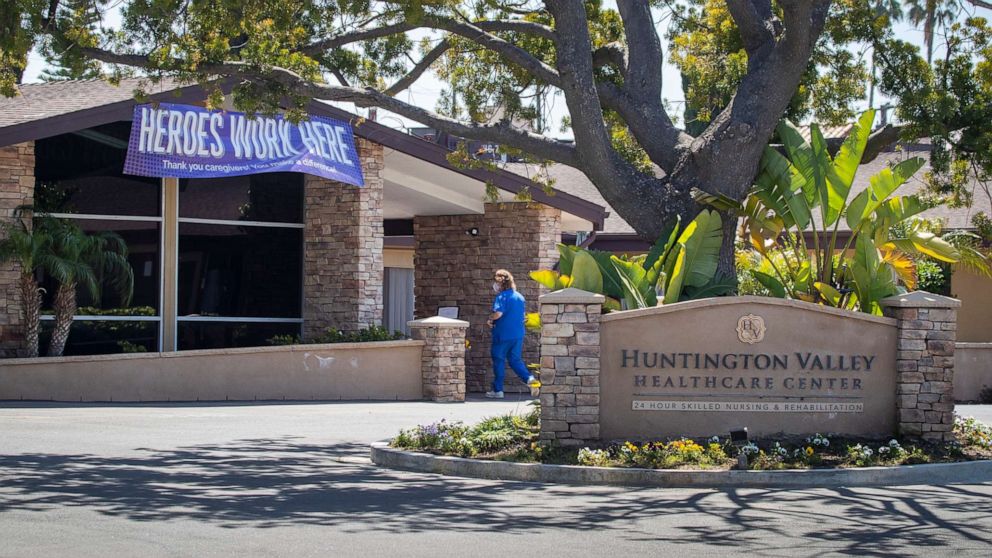 PHOTO: A person walks into an Orange County nursing home in Huntington Beach, Calif., April 22, 2020.