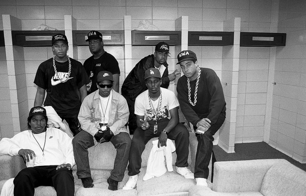 PHOTO: Ice Cube, Eazy-E, MC Ren. DJ Yella (front),and Dr. Dre, rapper Laylaw from Above The Law and rapper The D.O.C. pose for photos before their performances during N.W.A.'s 'Straight Outta Compton' tour at Kemper Arena in Kansas City, Mo, in June 1989.