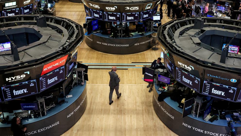 PHOTO: Traders work on the floor at the New York Stock Exchange (NYSE) in New York City, April 3, 2025.