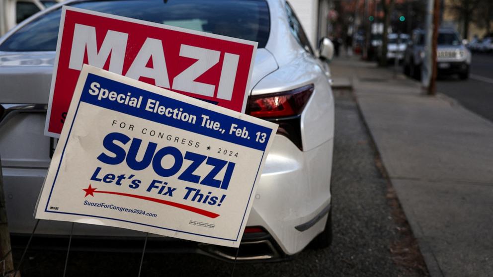 PHOTO: Campaign signs supporting Republican congressional candidate for New York's 3rd district Mazi Melesa Pilip and Democratic congressional candidate for New York's 3rd district Tom Suozzi stand posted in Port Washington, N.Y., Feb. 9, 2024. 