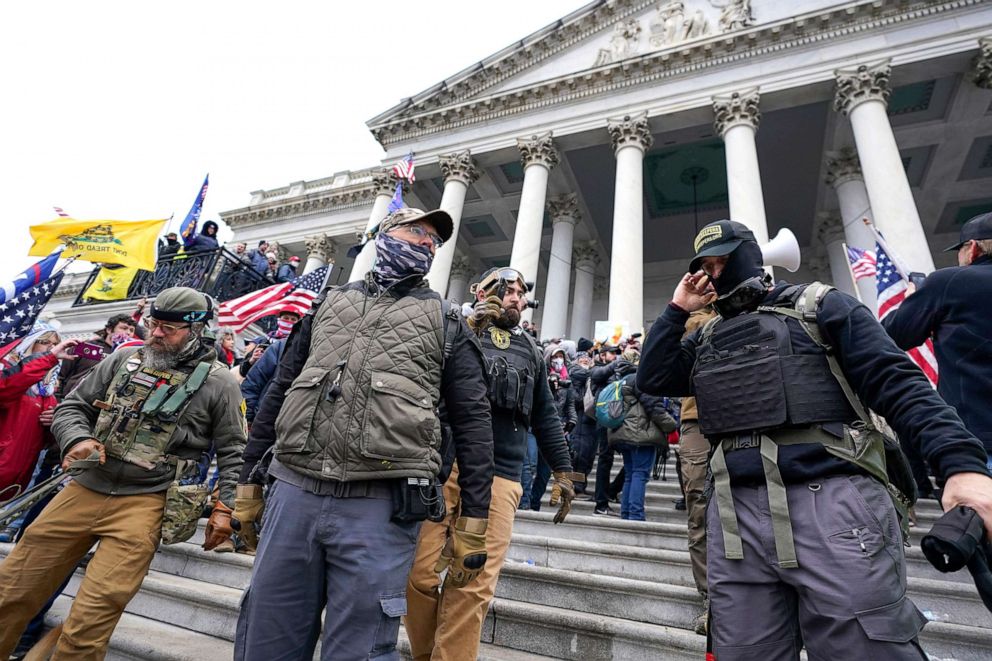 PHOTO: Members of the Oath Keepers stand on the East Front of the U.S. Capitol on Jan. 6, 2021, in Washington, D.C. 