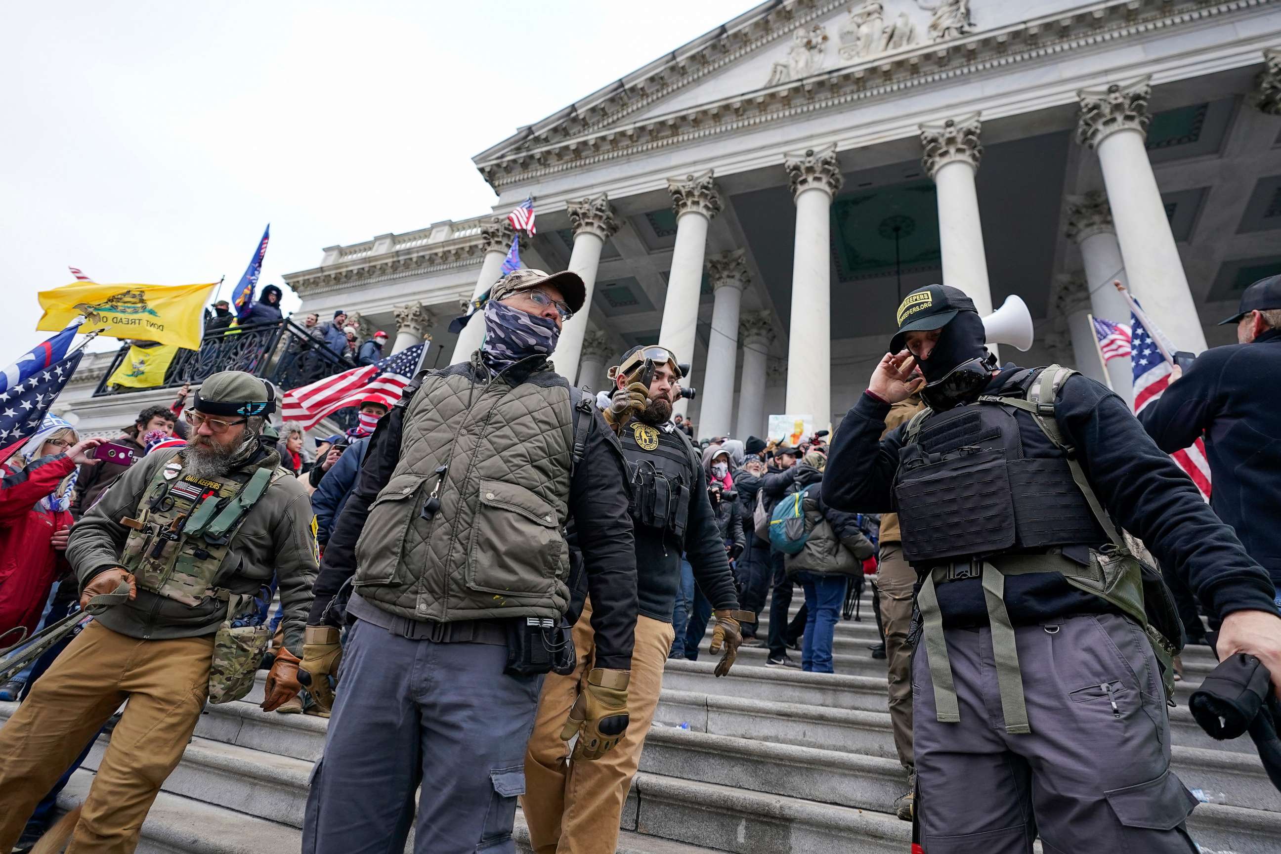PHOTO: Members of the Oath Keepers extremist group stand on the East Front of the U.S. Capitol on Jan. 6, 2021, in Washington, D.C.