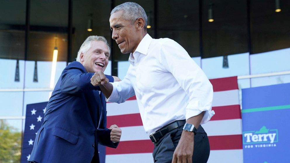 PHOTO: Virginia Democratic gubernatorial candidate Terry McAuliffe welcomes former President Barack Obama during his campaign rally in Richmond, Va. Oct. 23, 2021. 