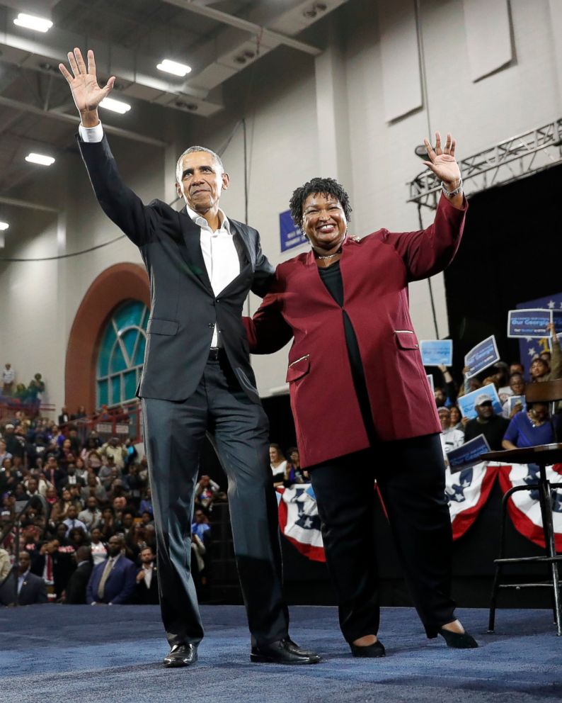 PHOTO: Former President Barack Obama and Democratic candidate for Georgia governor, Stacey Abrams, wave to the crowd during a campaign rally at Morehouse College Friday, Nov. 2, 2018, in Atlanta.