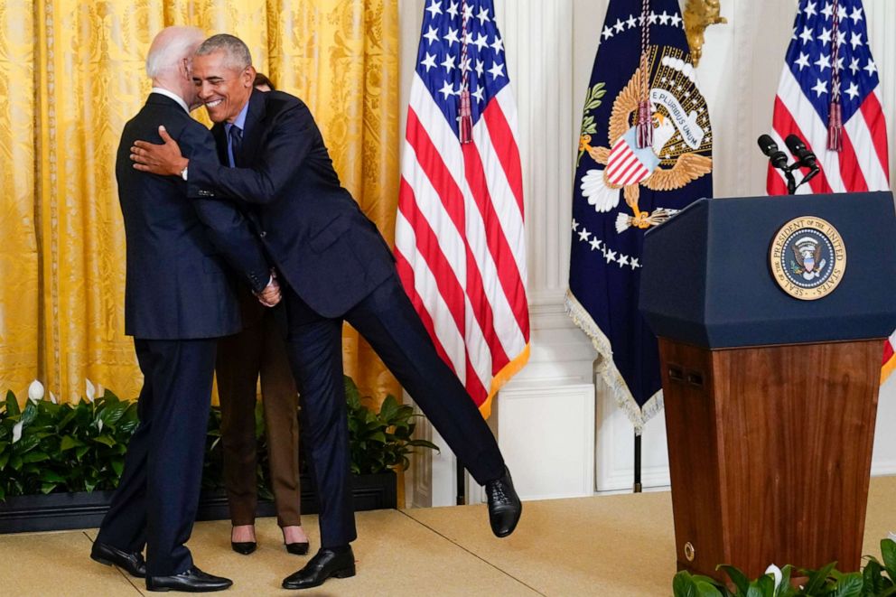 PHOTO: President Joe Biden hugs former President Barack Obama after Obama jokingly called Biden vice president in the East Room of the White House in Washington, April 5, 2022.