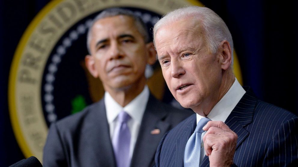 PHOTO: Vice President Joe Biden speaks as President Barack Obama looks during a bill signing in Washington, D.C., Dec. 13, 2016.