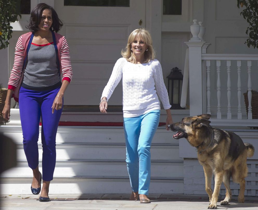 PHOTO: First Lady Michelle Obama and Dr. Jill Biden, wife of Vice President Joe Biden, and their dog Champ, arrive for a Joining Forces service event at the Naval Observatory in Washington, D.C., May 10, 2012.