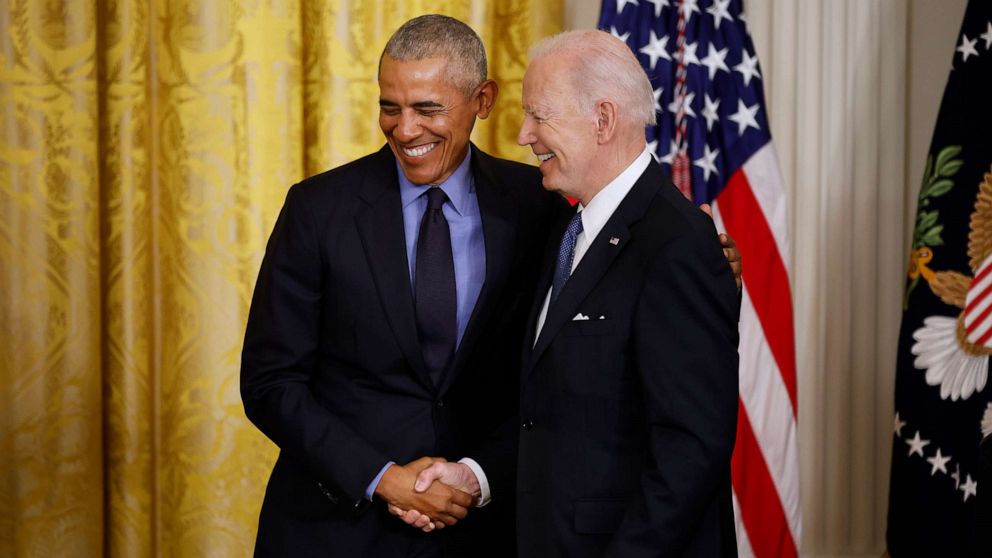 PHOTO: In this April 5, 2022, file photo, former President Barack Obama and President Joe Biden shake hands during an event to mark the 2010 passage of the Affordable Care Act in the East Room of the White House, in Washington, D.C.