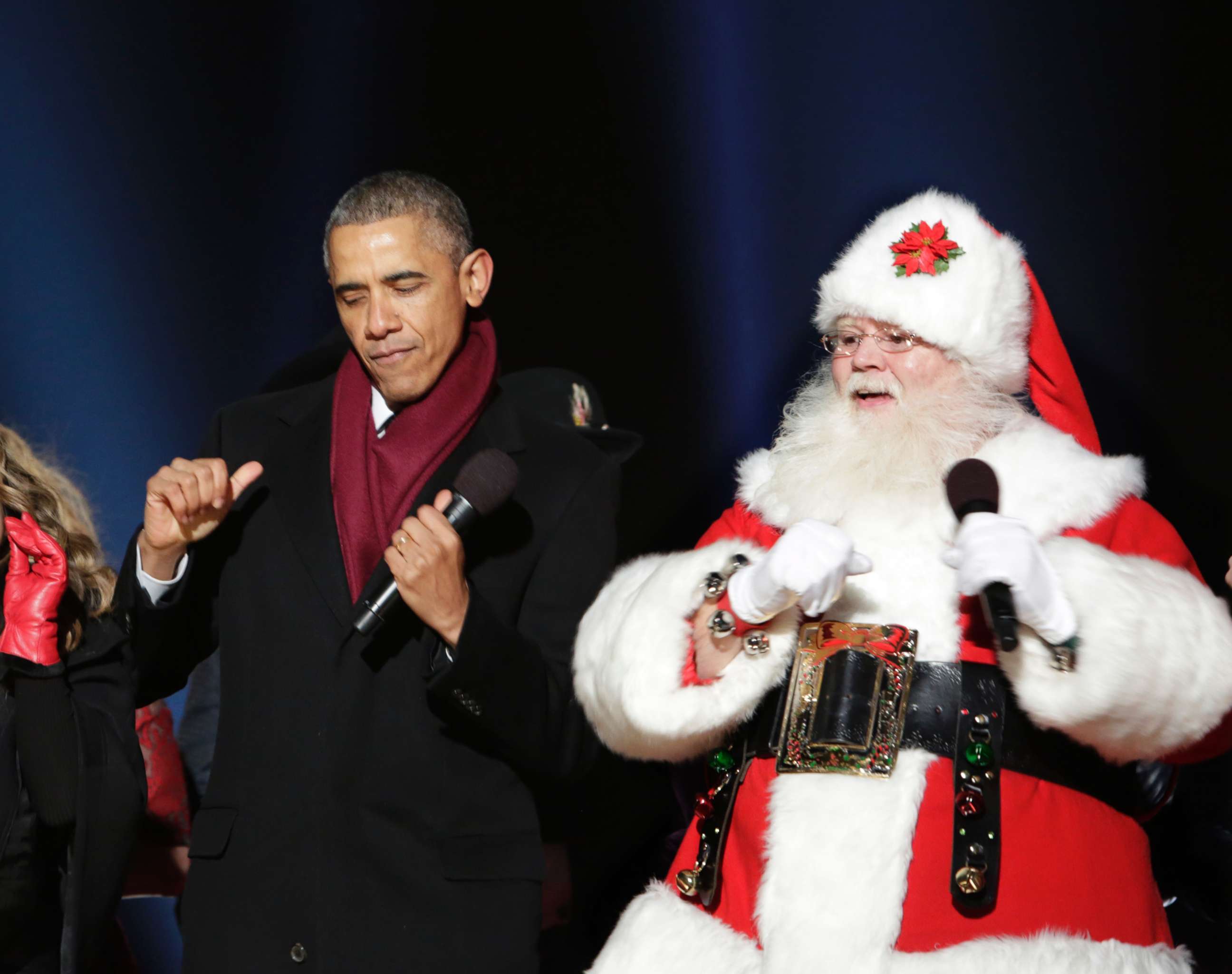 PHOTO: President Barack Obama dances with Santa Claus at the lighting of the National Christmas Tree, Dec. 4, 2014 in Washington.