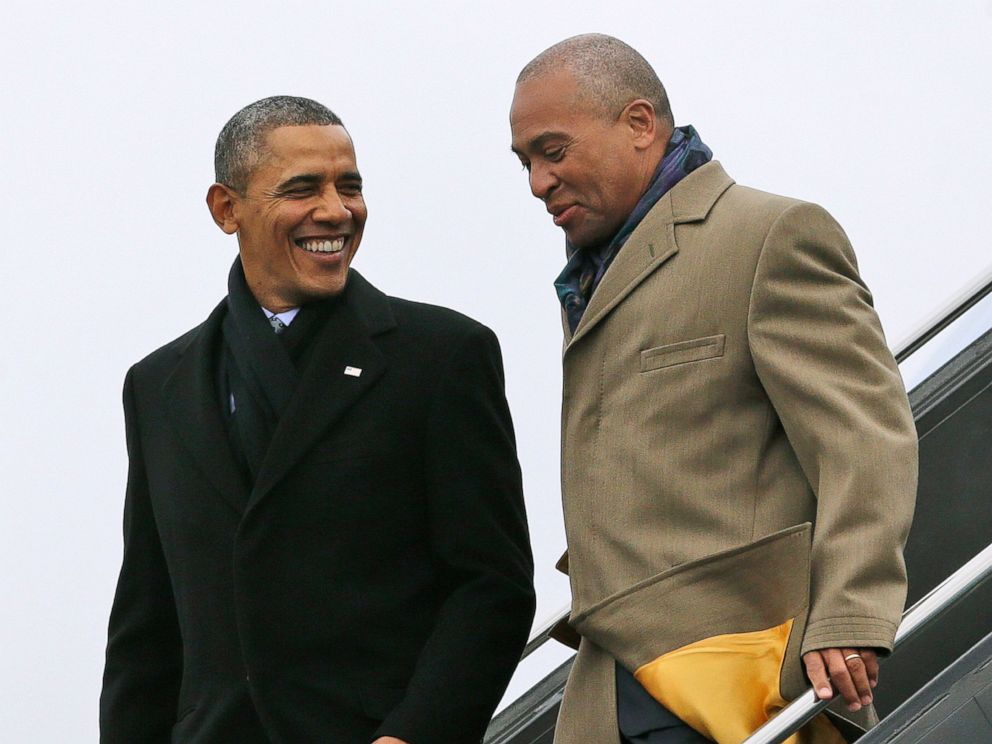 PHOTO: In this March 5, 2014 file photo, President Barack Obama, left, speaks with Massachusetts Gov. Deval Patrick upon arrival on Air Force One at Boston Logan International Airport in Boston.