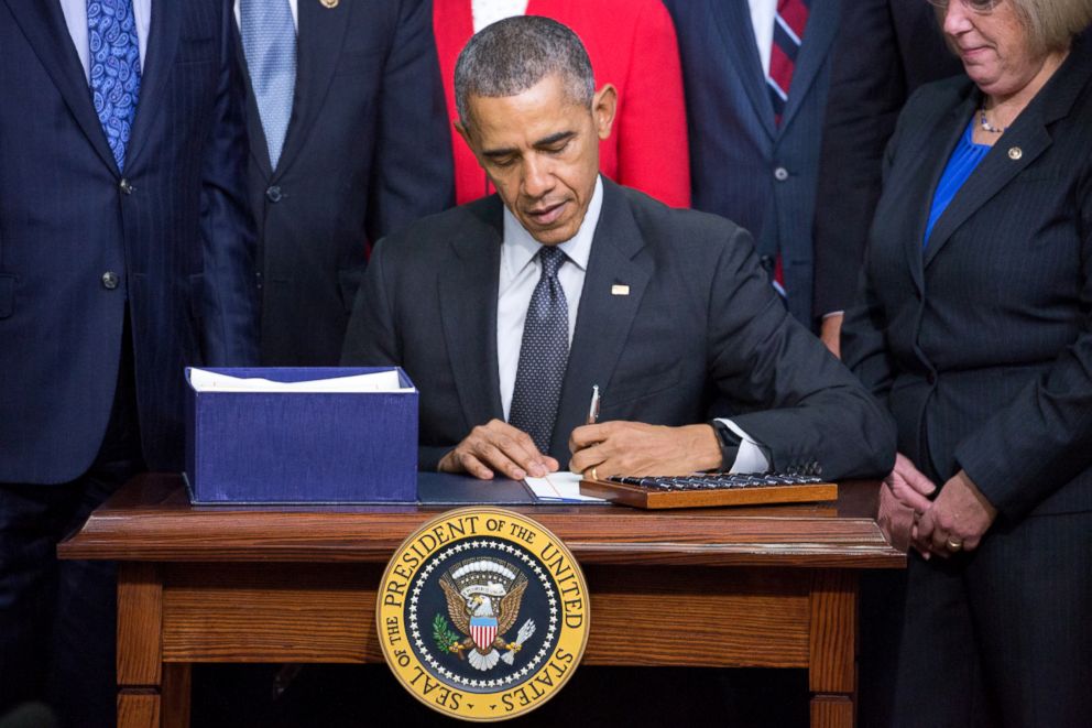  President Barack Obama signs the Every Student Succeeds Act, Dec. 10, 2015, in Washington, DC. 