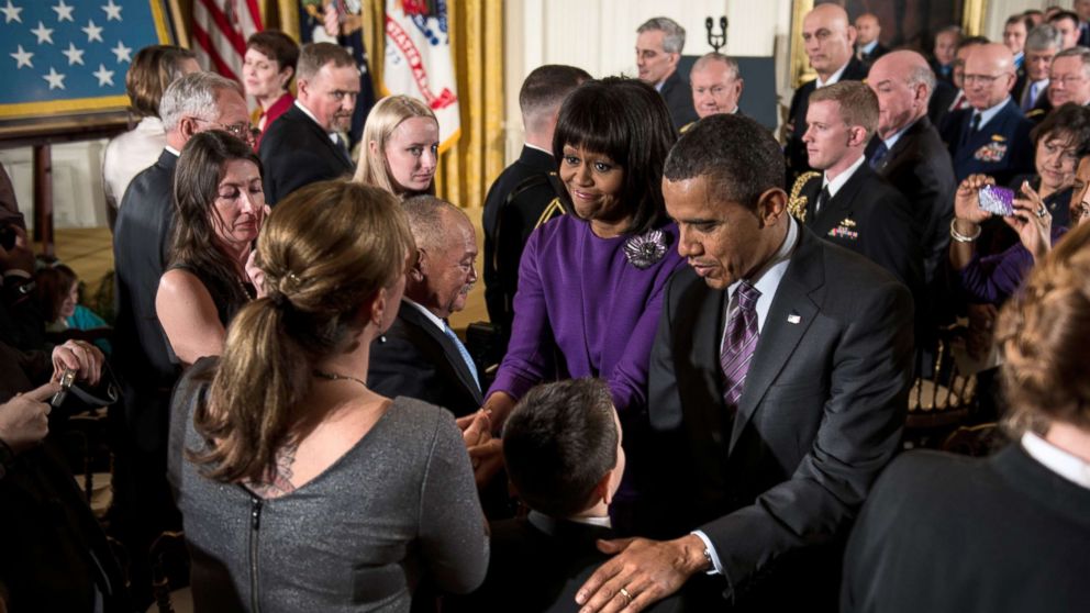 PHOTO: President Barack Obama and first lady Michelle Obama greet family members of fallen soldiers after a Medal of Honor ceremony in the East Room of the White House, 
Feb. 11, 2013.