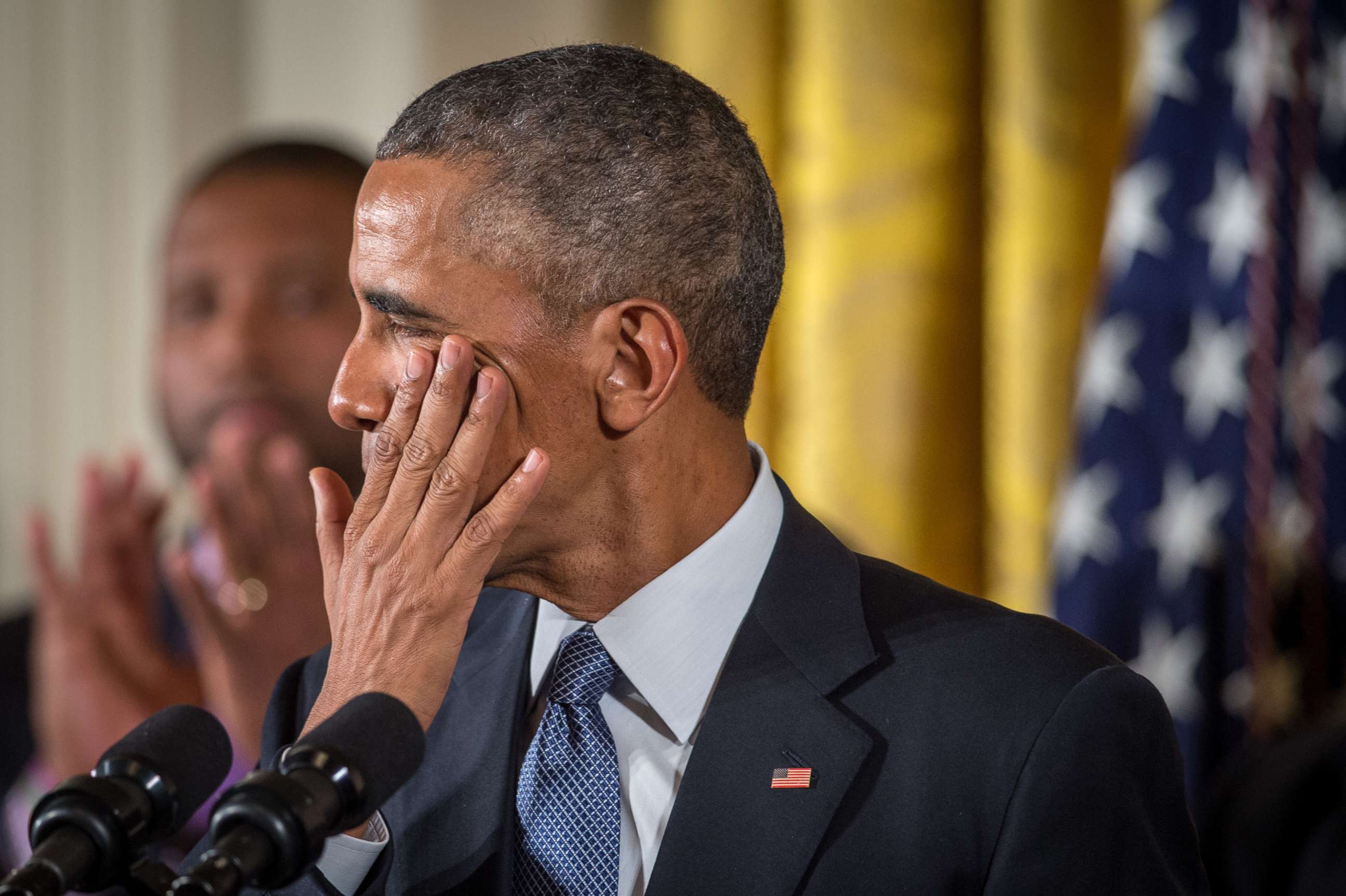 PHOTO: President Barack Obama wipes away tears as he talks about needless shootings at Sandy Hook Elementary school during a press briefing at the White House, Jan. 5, 2015, in Washington D.C.
