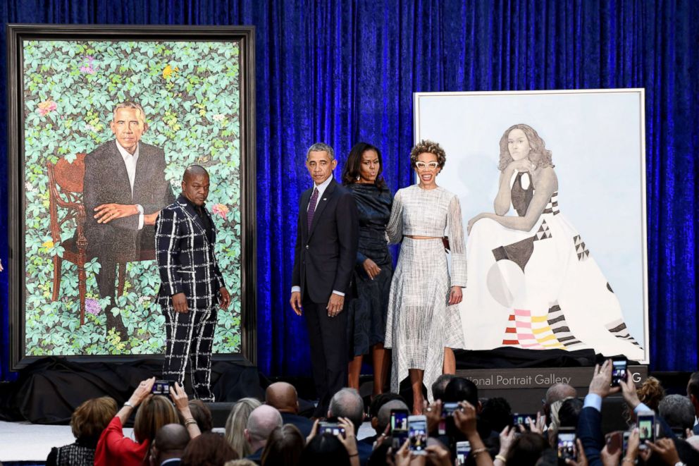 PHOTO: Former First Lady Michelle Obama and former President Barack Obama pose with Artists Kehinde Wiley and Amy Sherald during the unveiling of their official portraits at the National Portrait Gallery on Feb. 12, 2018, in Washington, D.C. 