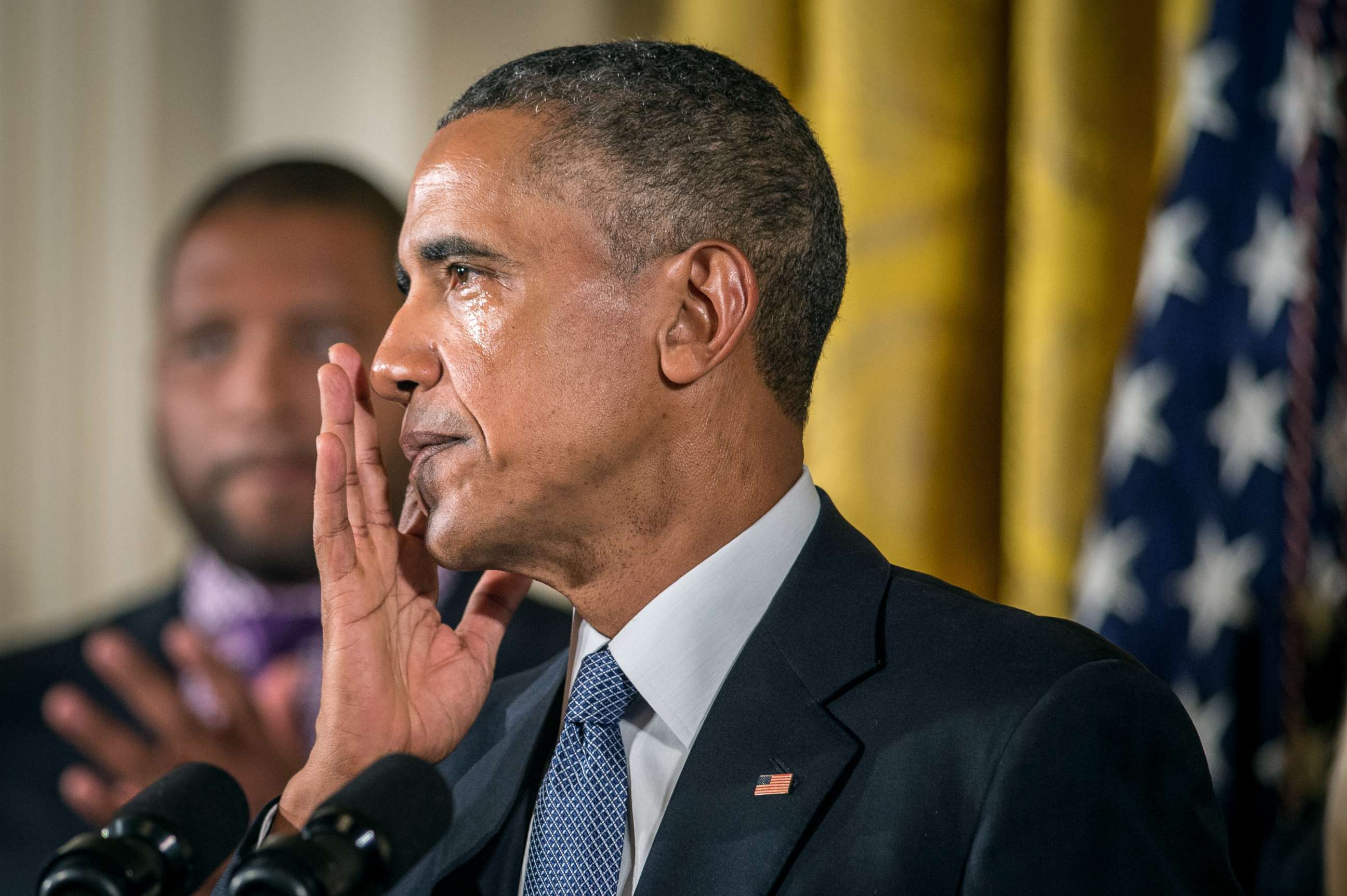 PHOTO: President Barack Obama wipes away tears as he talks about needless shootings at Sandy Hook Elementary school during a press briefing in the East Room of the White House, Jan. 5, 2015, in Washington D.C.