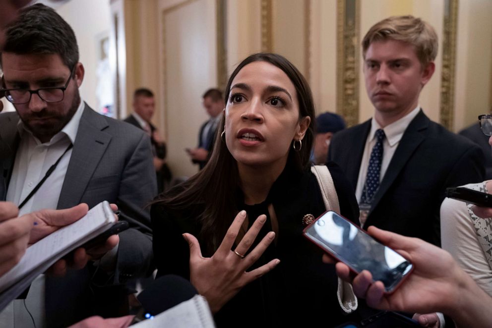 PHOTO:Rep. Alexandria Ocasio-Cortez, a target of racist rhetoric from President Donald Trump, responds to reporters as she arrives for votes in the House, at the Capitol in Washington, D.C., July 18, 2019.