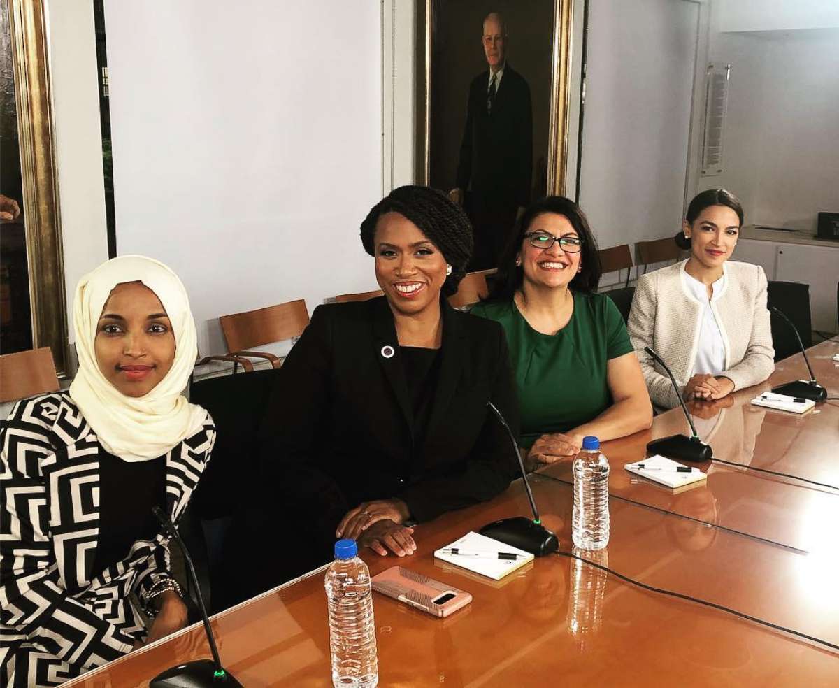 PHOTO: Ilhan Omar, Ayanna Pressley, Rashida Tlaib, and Alexandria Ocasio-Cortez sit at a table together at new House member orientation, Nov. 13, 2018.