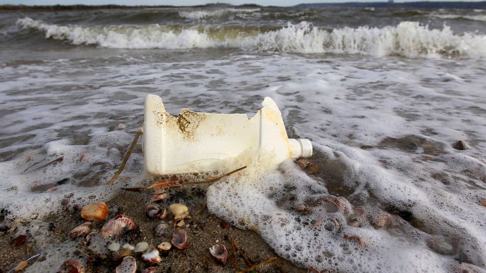 PHOTO: A plastic container litters the beach in Sandy Hook, N.J., April 18, 2011.