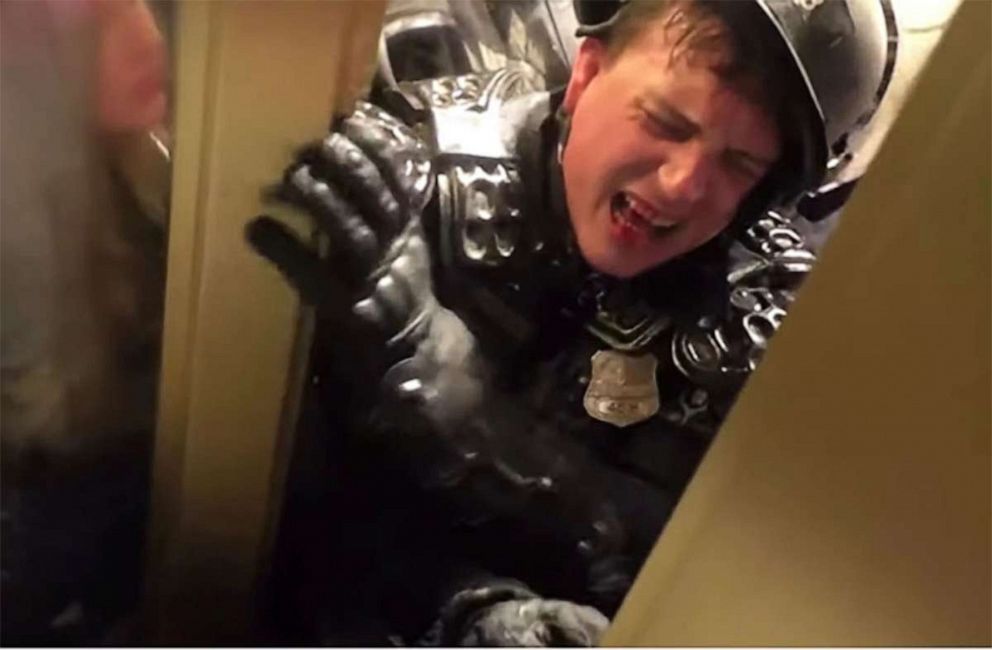 PHOTO: Officer Hodges is pictured being crushed in the doorway during the insurrection at the US Capitol, Jan. 6, 2021.