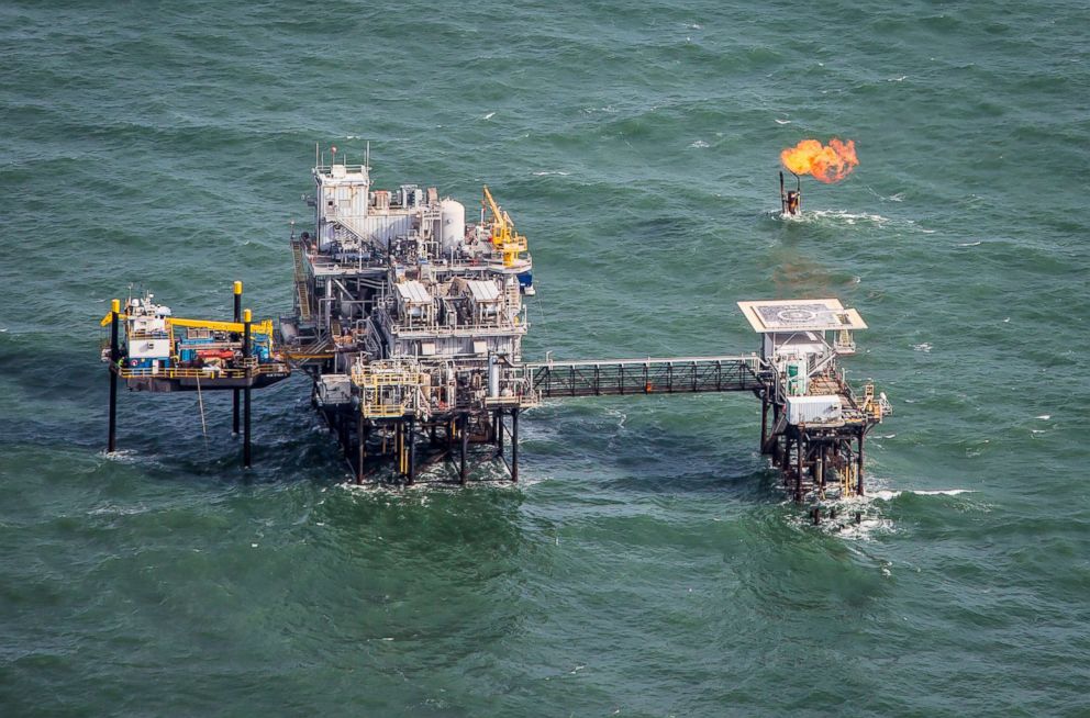 PHOTO: Aerial view of an oil production platform in the Gulf of Mexico with a flare of fthe coast of Port Fourchon, Louisiana's southernmost port.