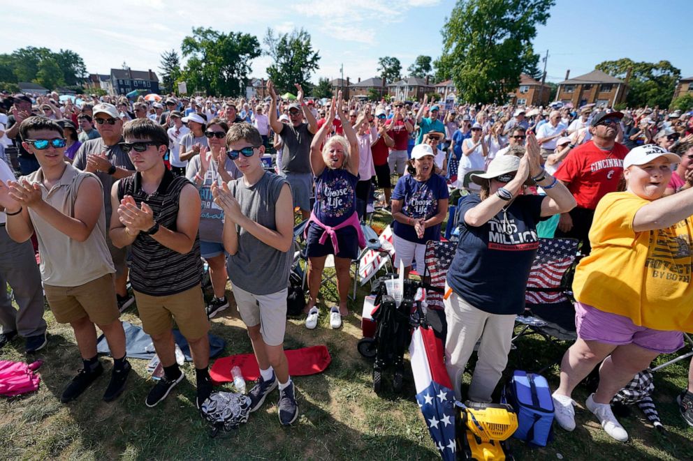 PHOTO: A crowd cheers as Jim Caviezel speaks during a "rosary rally" on Aug. 6, 2023, in Norwood, Ohio.