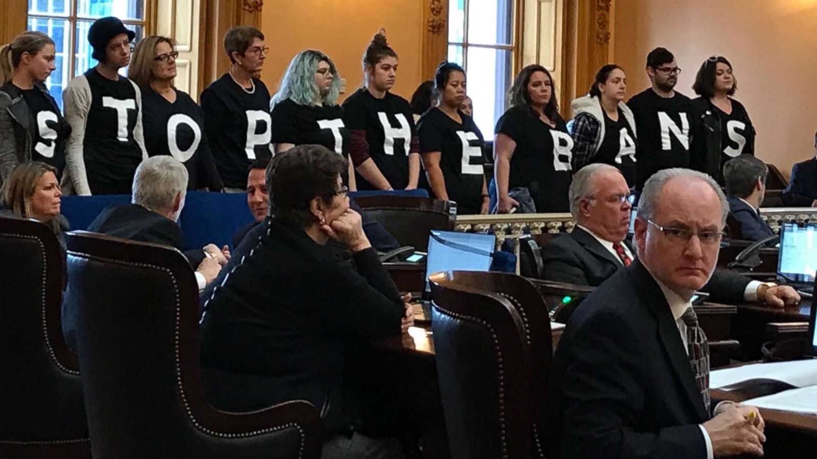 PHOTO: Abortion-rights activists stand in protest on Wednesday, Dec. 13, 2017, in the Ohio Senate chamber in Columbus, after passage of a bill banning abortions in cases of a Down syndrome diagnosis.