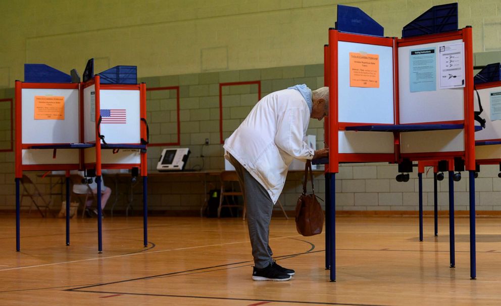 PHOTO: A voter fills in her ballot during primary voting at Central Elementary School, May 3, 2022 in Kent, Ohio. 