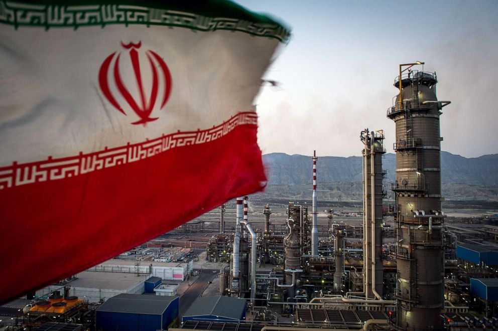 PHOTO: An Iranian national flag flies at the Persian Gulf Star Co. gas condensate refinery in Bandar Abbas, Iran in this Jan. 9. 2019 file photo.