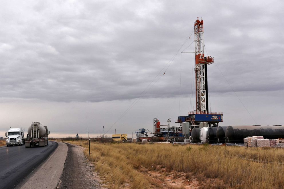 PHOTO: A drilling rig operates in the Permian Basin oil and natural gas production area in Lea County, New Mexico, Feb. 10, 2019.