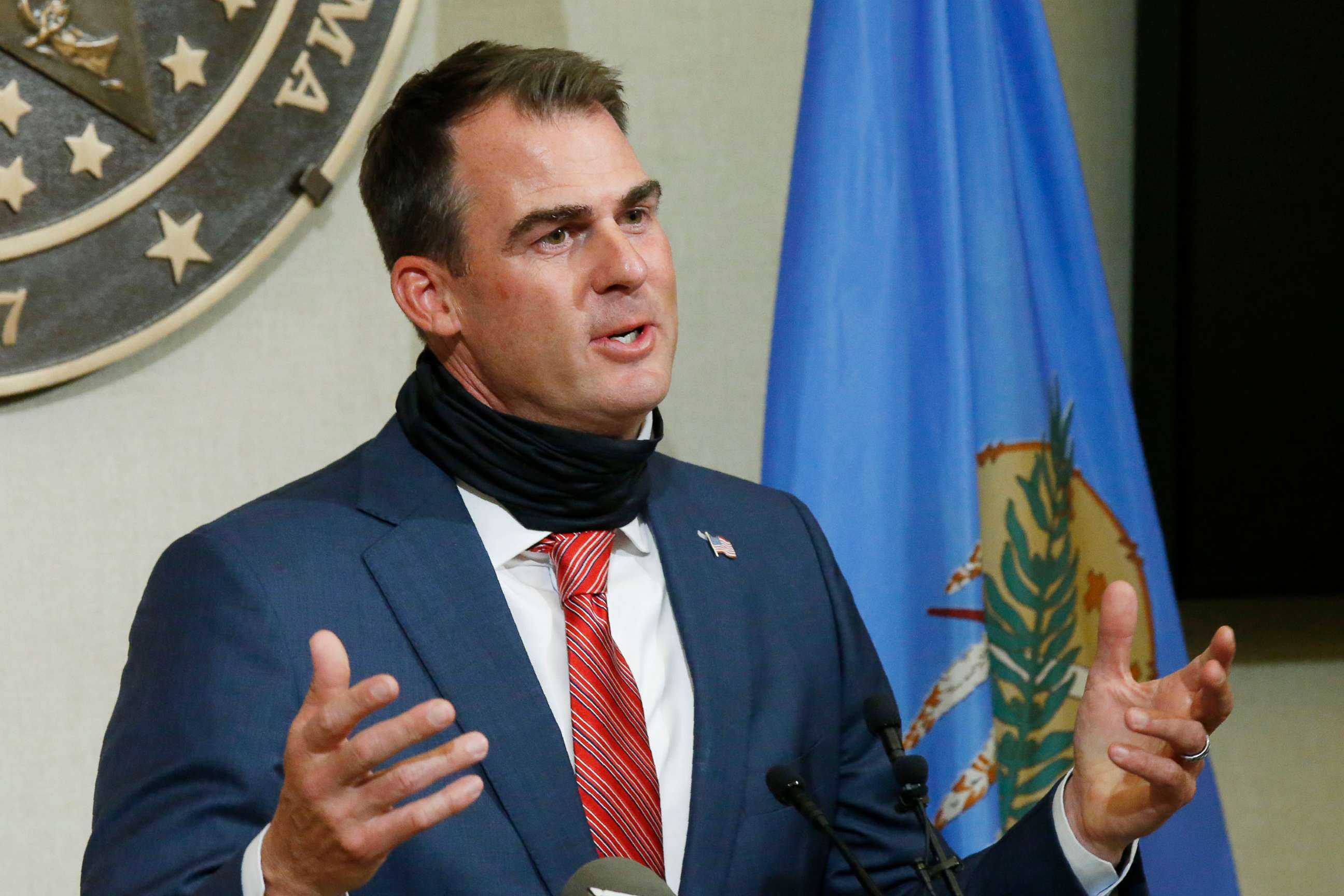 PHOTO: Oklahoma Gov. Kevin Stitt gestures as he speaks during a news conference, June 30, 2020, in Oklahoma City. 