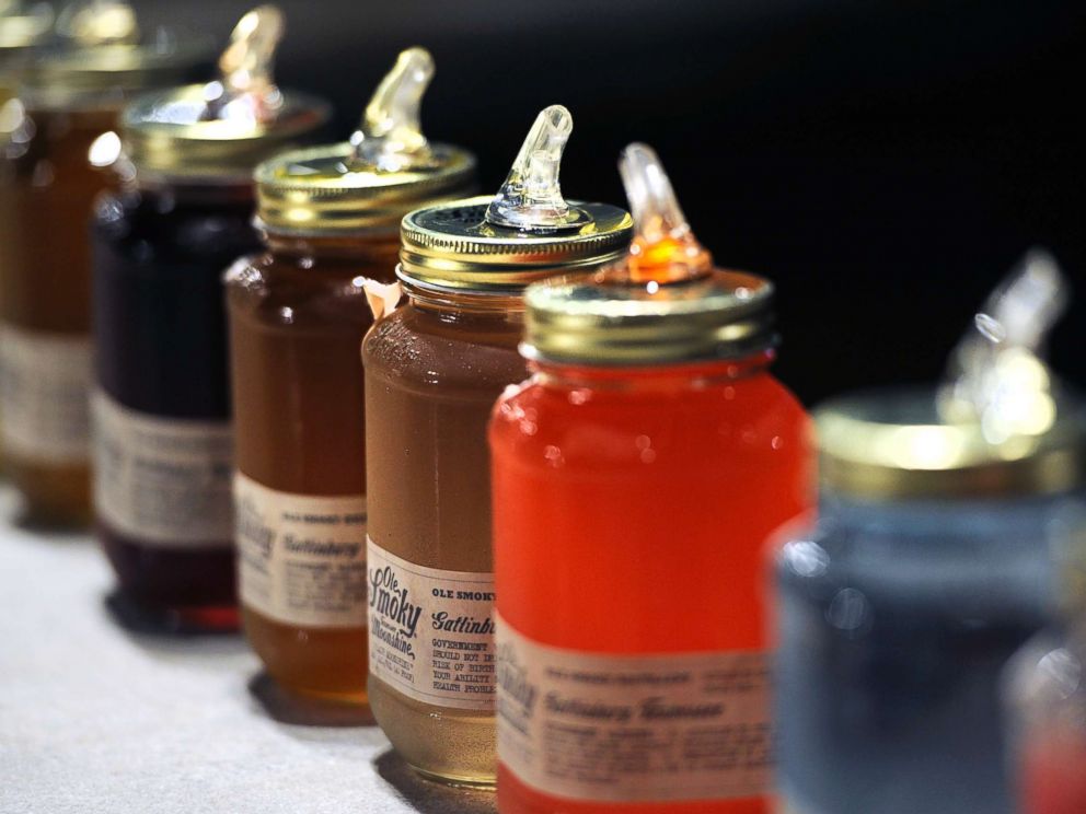 PHOTO: Jars of moonshine for sampling sit on display at Ole Smoky Distillery in Gatlinburg, Tenn., April 16, 2015.