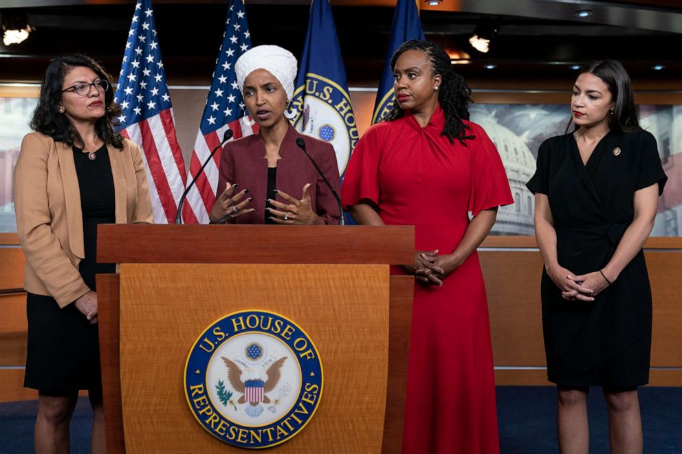 PHOTO: Rep. Ilhan Omar, second from left, speaks, as Reps., from left, Rashida Tlaib, Ayanna Pressley, and Alexandria Ocasio-Cortez, listen, during a news conference at the Capitol in Washington, D.C.