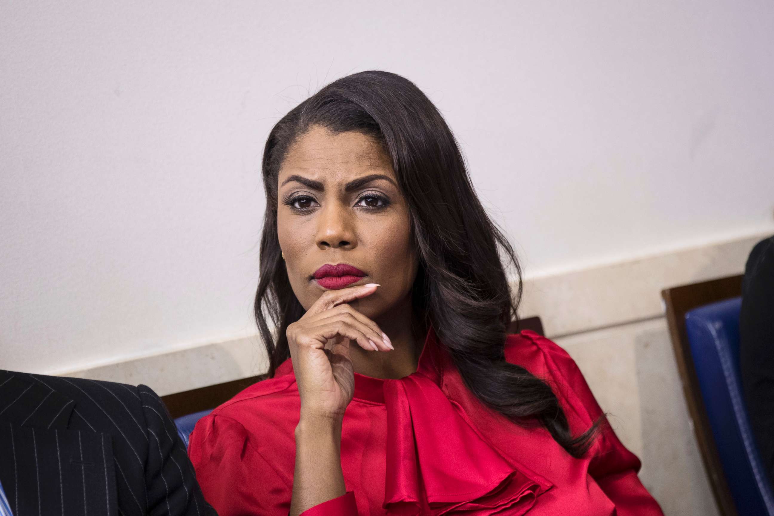 PHOTO: Omarosa Manigault listens during the daily press briefing at the White House, Oct. 27, 2017 in Washington, D.C.